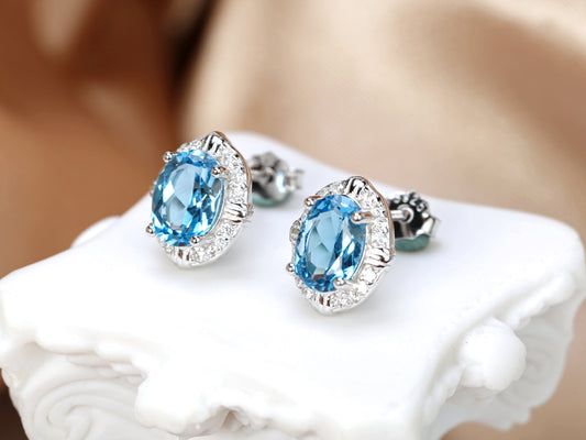 Blue Topaz Halo Stud Earrings