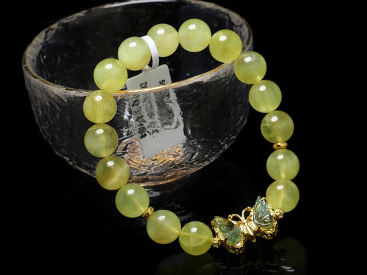 Butterfly Bloom · Golden Prehnite Bracelet with Silver Gilt Charm