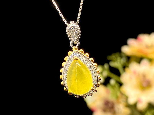 Golden Drop · Two-Tone Gem Halo Pendant