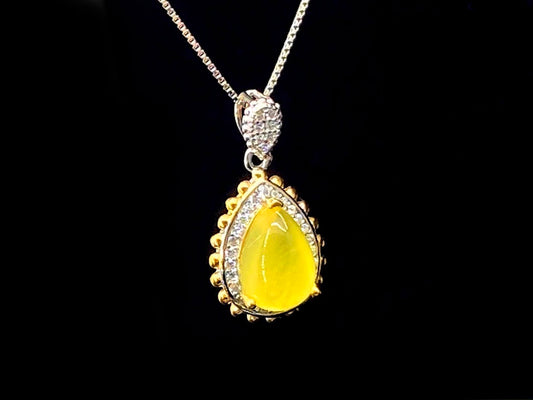Golden Drop · Two-Tone Gem Halo Pendant