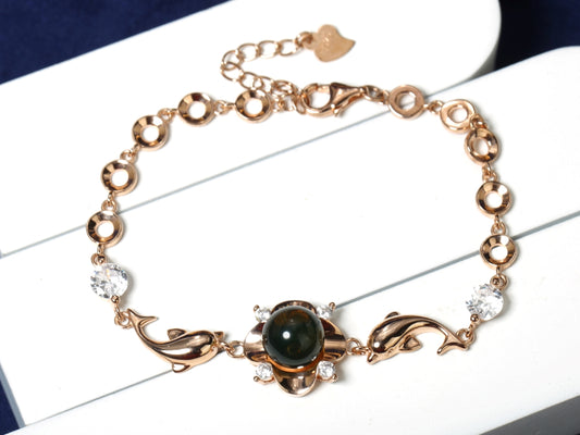 Elegant Blue Amber Dolphin Charm Rose Gold-Tone Bracelet