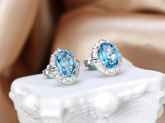 Blue Topaz Halo Stud Earrings