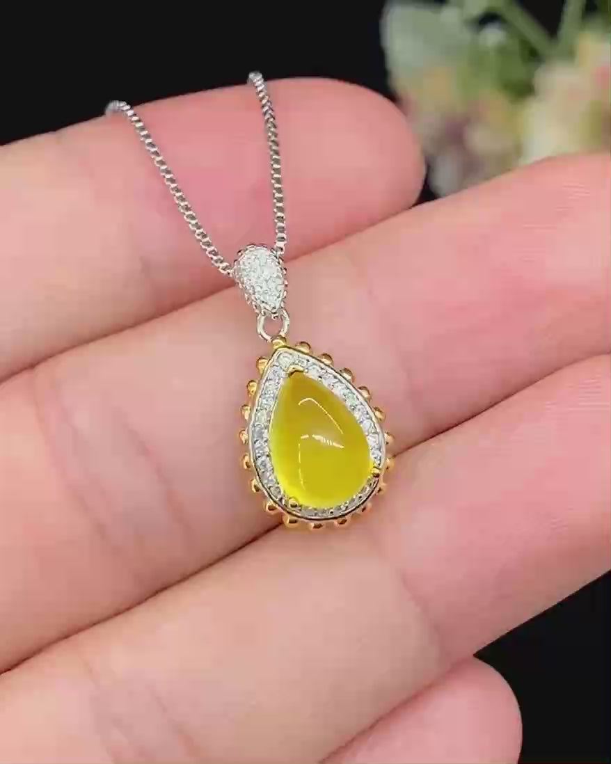 Golden Drop · Two-Tone Gem Halo Pendant